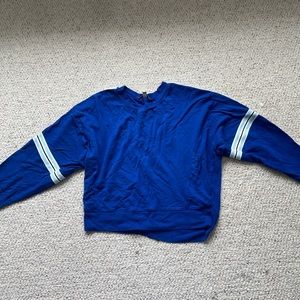 royal blue sewater with stripes on sleeve